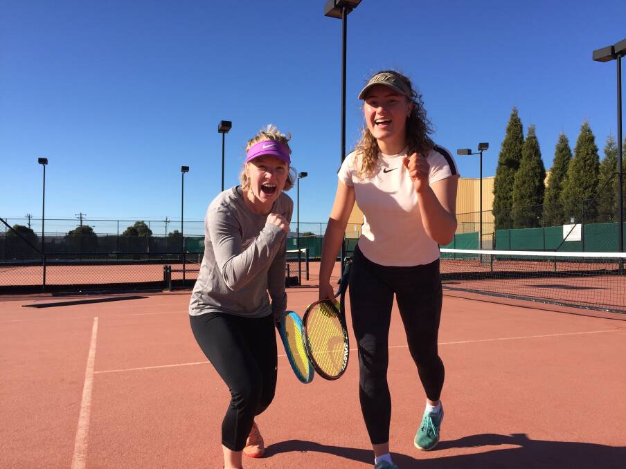 CHEERING: Ballarat tennis players Marleen Gort and Milla Fraser are pumped ahead of Ash Barty's Wimbledon singles final on Saturday night. Pictures: Melanie Whelan