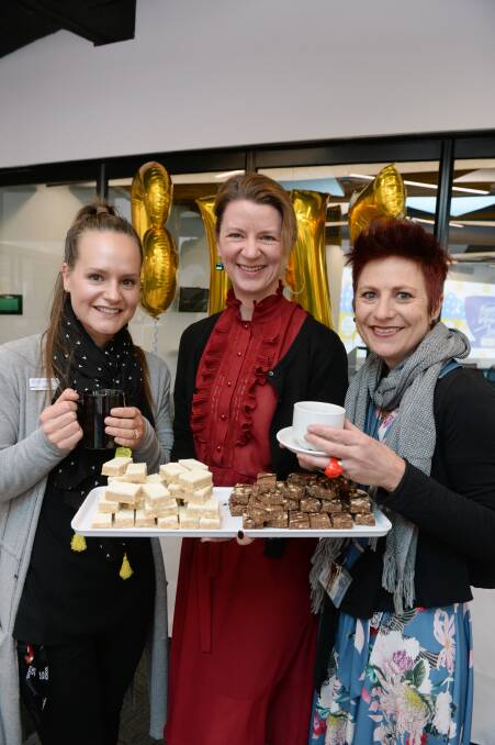 SUPPORT: Hayley Chaplin (Ballarat Tech School), Michelle Whyte (Leadership Ballarat and Western Region) and Claire Rasmussen (Fed Uni) enjoy a cuppa for a good cause. Picture: Kate Healy