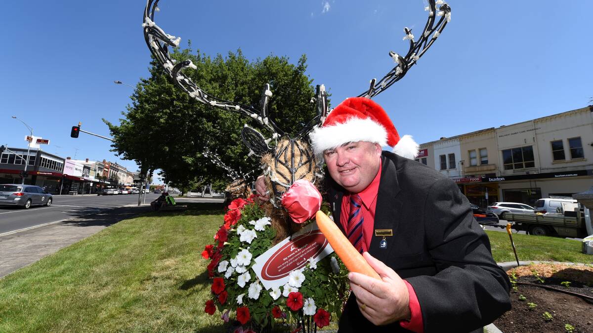 Councillor Des Hudson feeds Ballarat's Rudolph last Christmas. Picture: Lachlan Bence