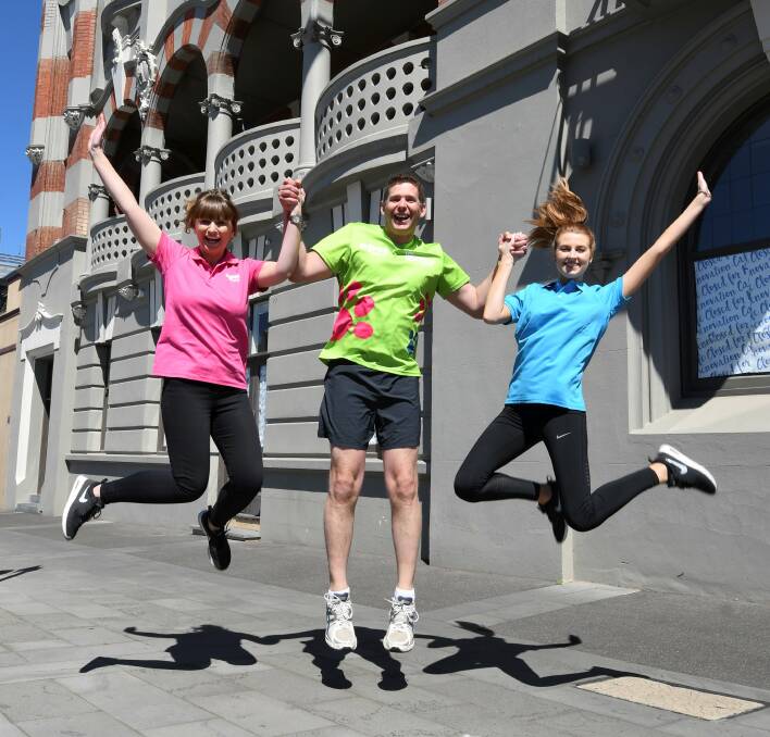 HAPPY: PETStock's Katrina Reid, Dion Collard, Hannah Ladd encourage other Ballarat business to get teams moving for improved health, well-being and a good community cause. Picture: Lachlan Bence