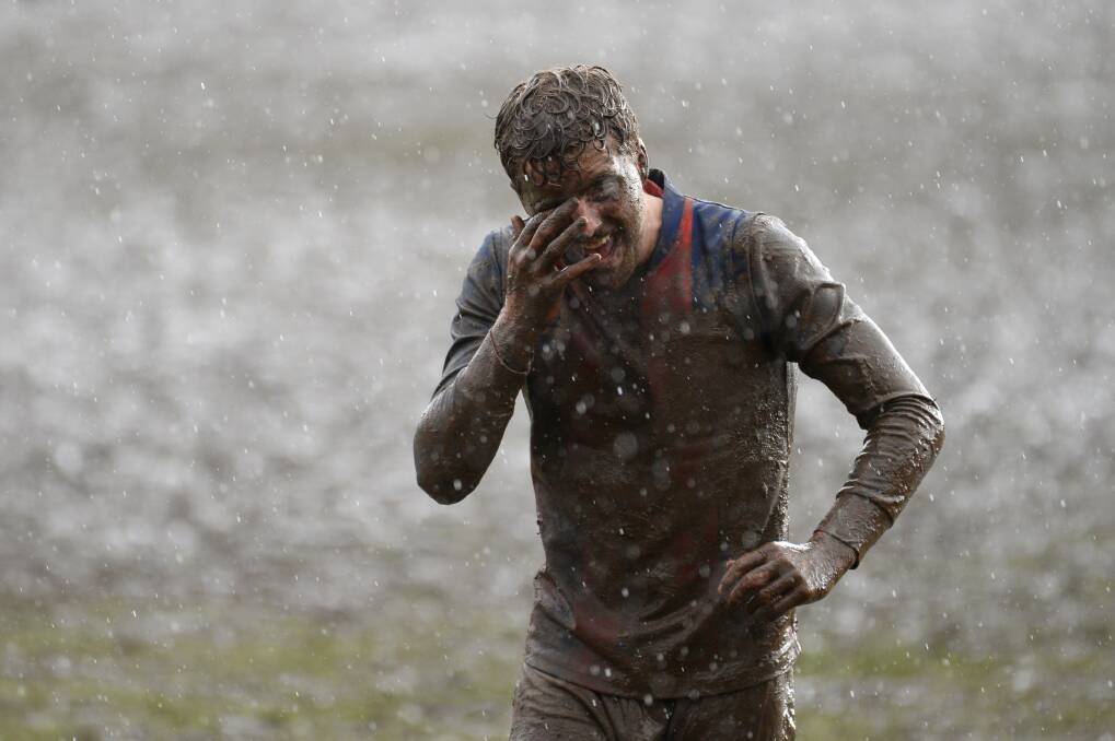 BREAK: When it comes to minutes needed to refresh at half-time in football, perhaps those best qualified to answer are our muddy Central Highlanders. Picture: Kate Healy