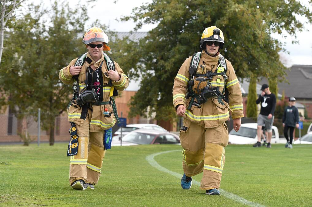 Firefighters step out in force to raise community awareness and talk for defence and emergency service personnel mental health in the 2021 Walking Off the War Within. Picture by Adam Trafford