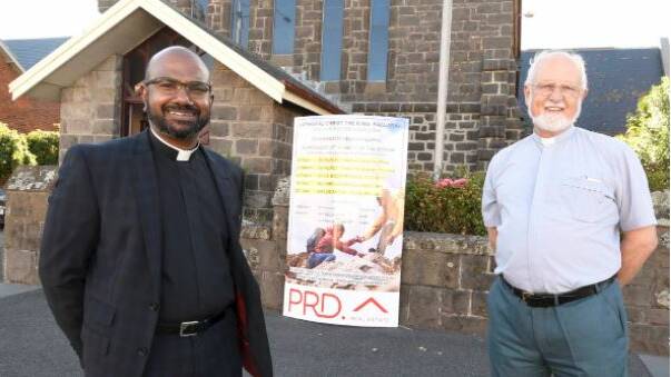 READY TO TALK: Anglican Church of Christ the King's Father Martin Nadarajan with associate clergy Mark Garner. Picture: Lachlan Bence
