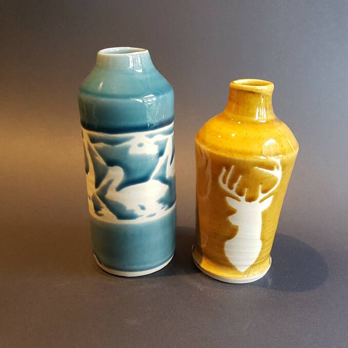 SAMPLE: Ceramist Lizze Tongway says there is great joy and anticipation in seeing how a glaze works after the kiln. She hopes to share her joy with those who use her wares, like these vases.