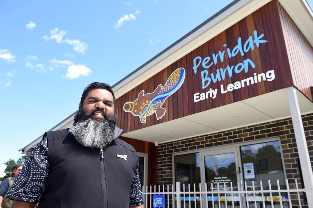 STORY: Indigenous artist Shirahan Brown with his Perridak Burron small platypus logo design. Picture: Kate Healy