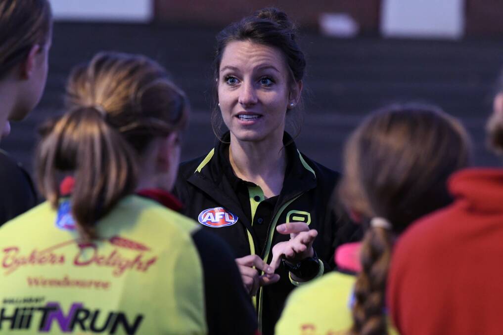 PATHWAY: Eleni Glouftsis, leading a session with Ballarat umpires, wants to show all young umpires they can reach elite ranks, particularly if they work as a team.