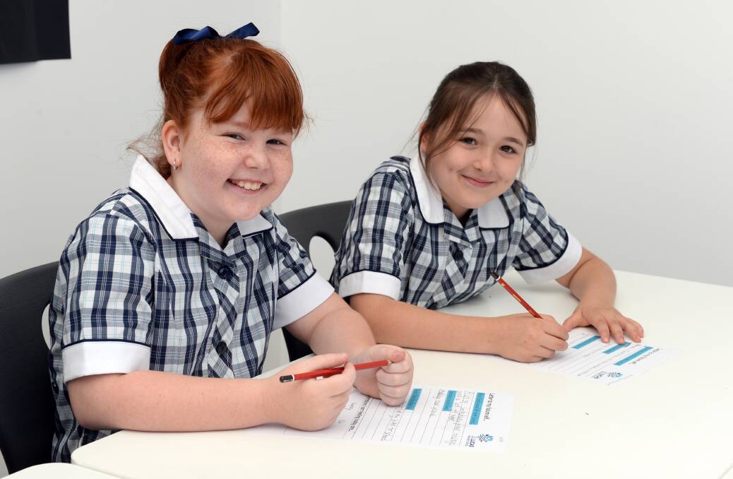 SMILES: Lucas pupils Amelia and Alyssa. Picture: Kate Healy