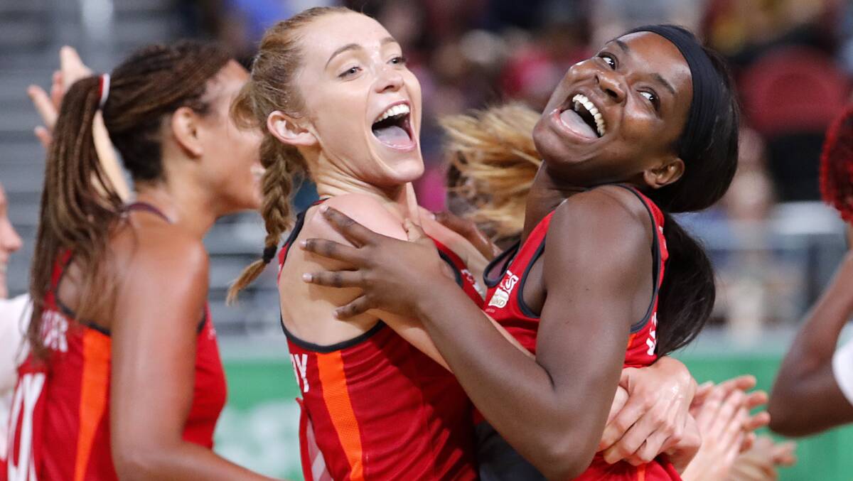 WTACH-OUT: England's Helen Housby, left, inflicted the match-stealing goal that left Australia reeling in the Commonwealth Games. These are the heavyweight showdowns world netball fans want to see. Picture: AP