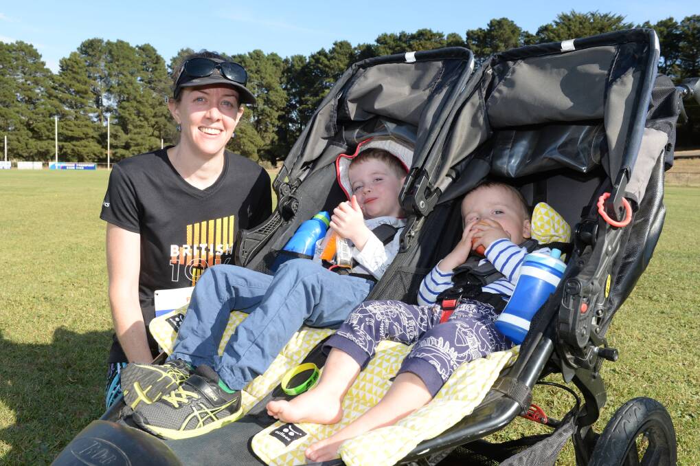 MOVE: Mum Liz Walsh ran the Mountain of Fun Run course, up Mount Warrenheip, last year pushing Connor and Hamish. The community event was this week postponed.