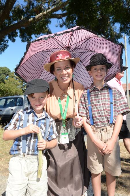 SMILES: Gordon's Jaxon, Ally and Wes Giofches get into Ballan Autumn Festival's pioneering spirit. Picture: Kate Healy