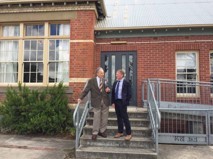 GUIDANCE: Former Pinarc chairman John Mildren and Pinarc chairman Barry Packham meet on the steps of the former Golden Point Primary School to proud look how much programs had evolved the past 20 years.