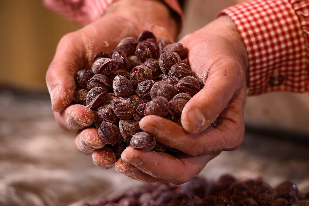 UP CLOSE: Sovereign Hill makes 20 tonnes of raspberry drops alone each year. Picture: Adam Trafford