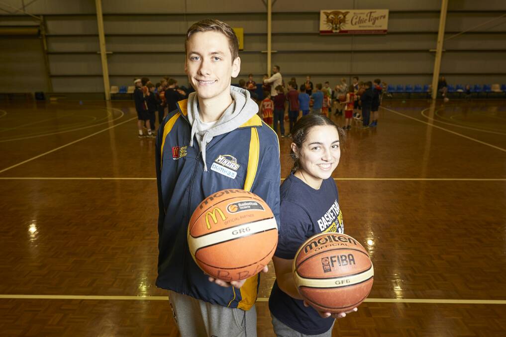 BOOST: Rising Ballarat basketball stars Sam Short and Georgia Amoore welcome the initial announcement for the Basketball Victorian Country under-14 championships made last August. Picture: Luka Kauzlaric
