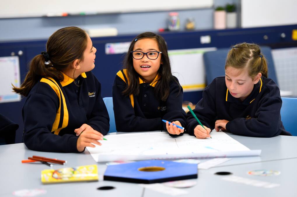 Canadian Lead Primary School pupils Philippa Rupapera, Myiesh De Leon and Phoebe Walter brainstorm what makes an entrepreneur. Picture: Adam Trafford