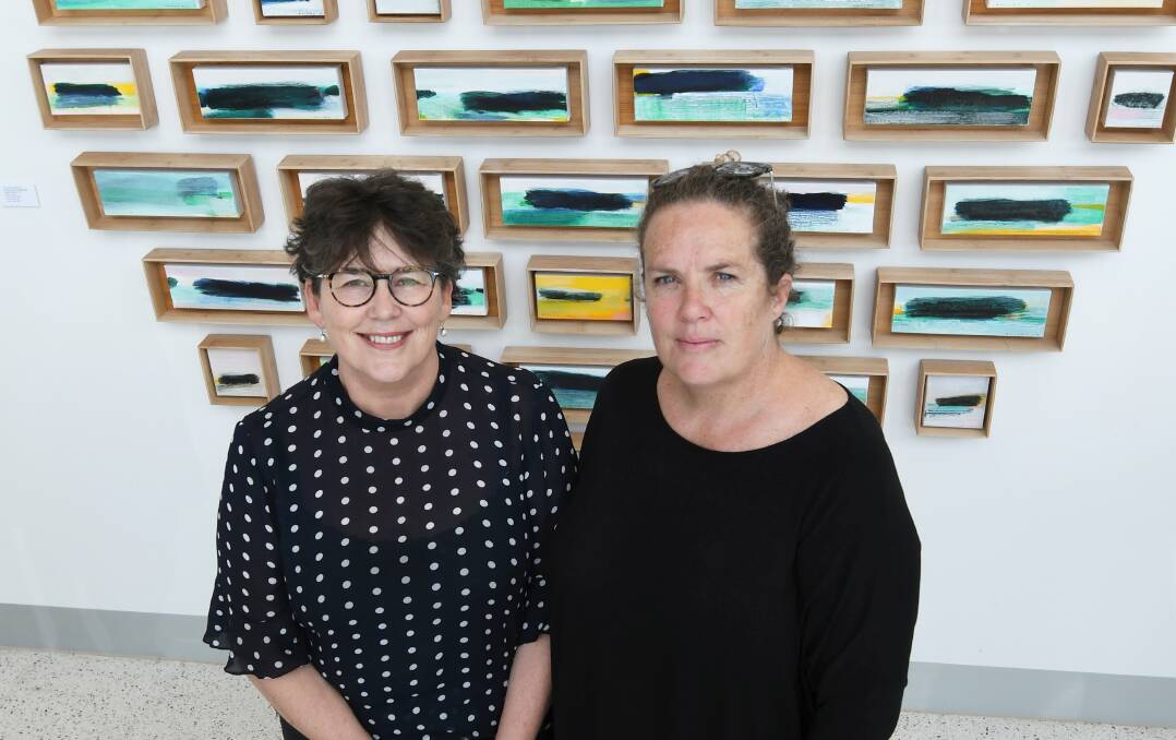 BRIGHT NOTE: Ballarat Health Services chief medical officer Rosemary Aldrich with Ballarat artist Tarli Glover, who has produced a pop-up Gallery for the Gardiner-Pittard foyer as part of the Ballarat Evolve program. Picture: Lachlan Bence