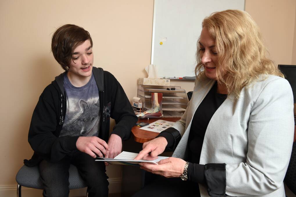 LEARNING: Ballarat teenager Jacob Payne talks with Ballarat Health Services diabetes educator Sandra Anstis, about how to best manage his diabetes. Picture: Kate Healy