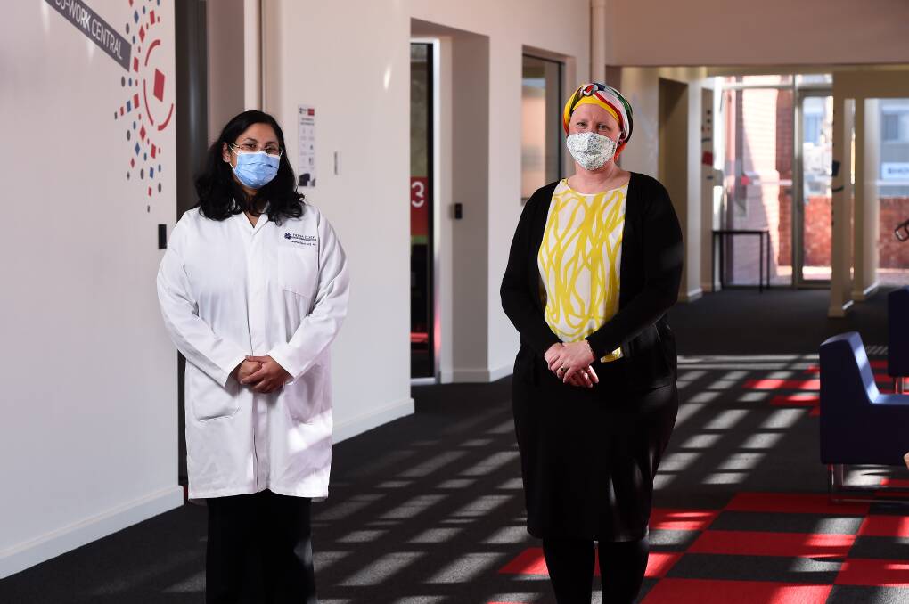 WORKING TOGETHER: Rachael Murnane (right) is undergoing treatment for a rare breast cancer but donated her tissue for research under Fiona Elsey Cancer Research Institute's breast cancer lead Aparna Jayachandran. Picture: Adam Trafford