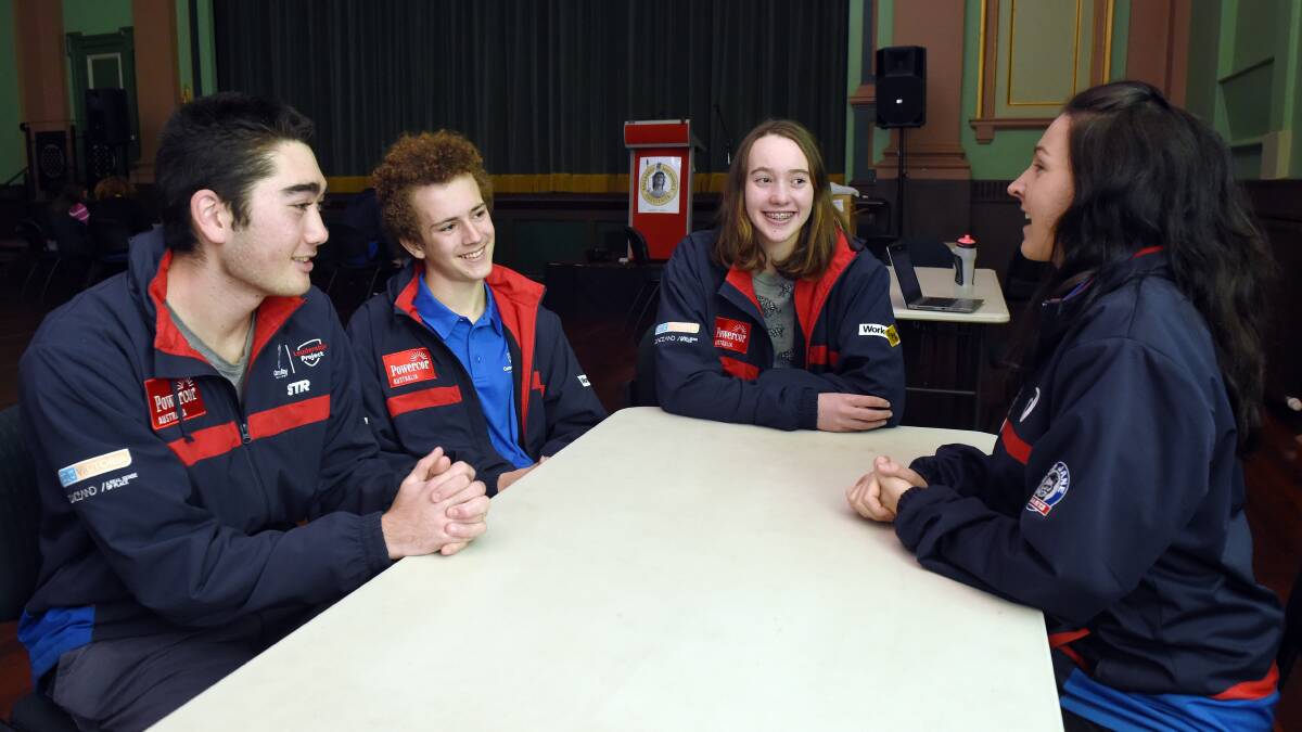 ADVICE: Alistair McBride, Toby Turnham and Francesca Howe chat sports management with Western Bulldogs' Emma Powell. Picture: Kate Healy