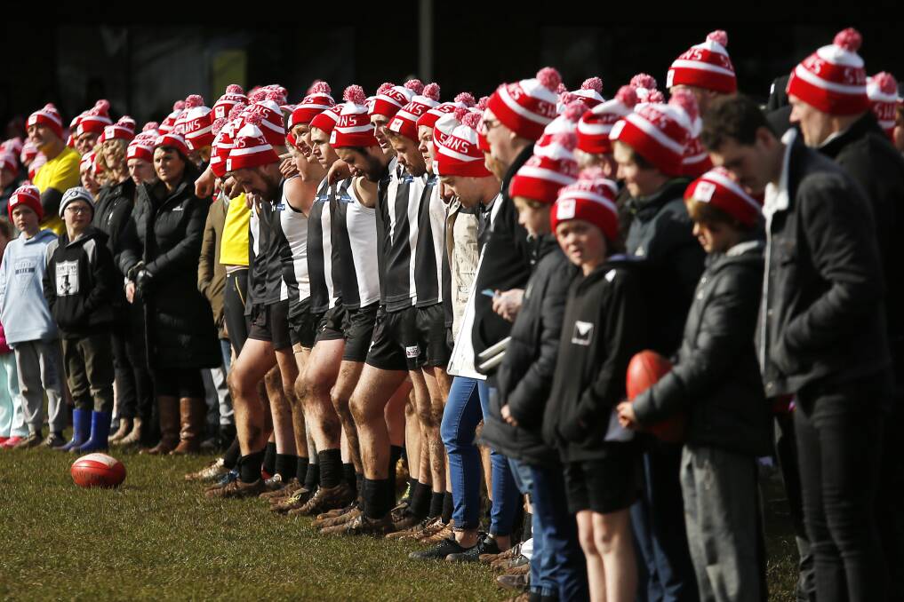 LEGACY: The first match in tribute to Lachie Poulter with clubmates sporting Sydney Swans beanies in his honour.