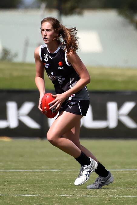 STEPPING UP: Greater Western Victoria Rebels' Maggie Caris (Horsham Saints) joins Melbourne via this year's AFLW draft. More is needed to better promote women in coaching roles. Picture: Adam Trafford
