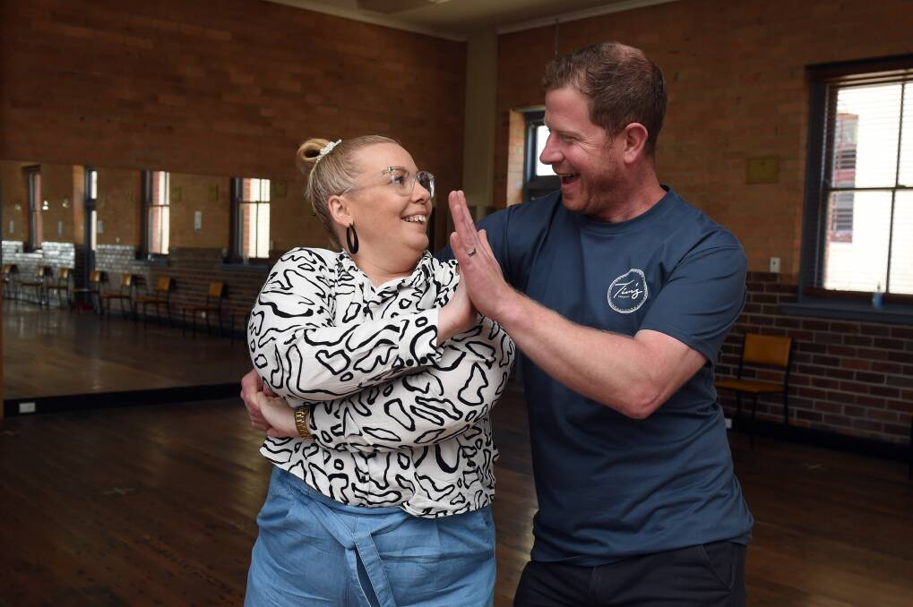 STAR QUALITY: Masterchef contestant and toastie guru Tim Bone starts learning his moves with dance partner Ashlie Ross on Friday in the Dancing with our Stars launch. Picture: Kate Healy
