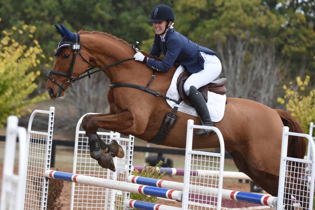TEAM-WORK: Melissa Peacock riding Serenity Lane Romeo in showjumping action for Ballarat International Horse Trials at Ballarat Pony Club. Picture: Kate Healy