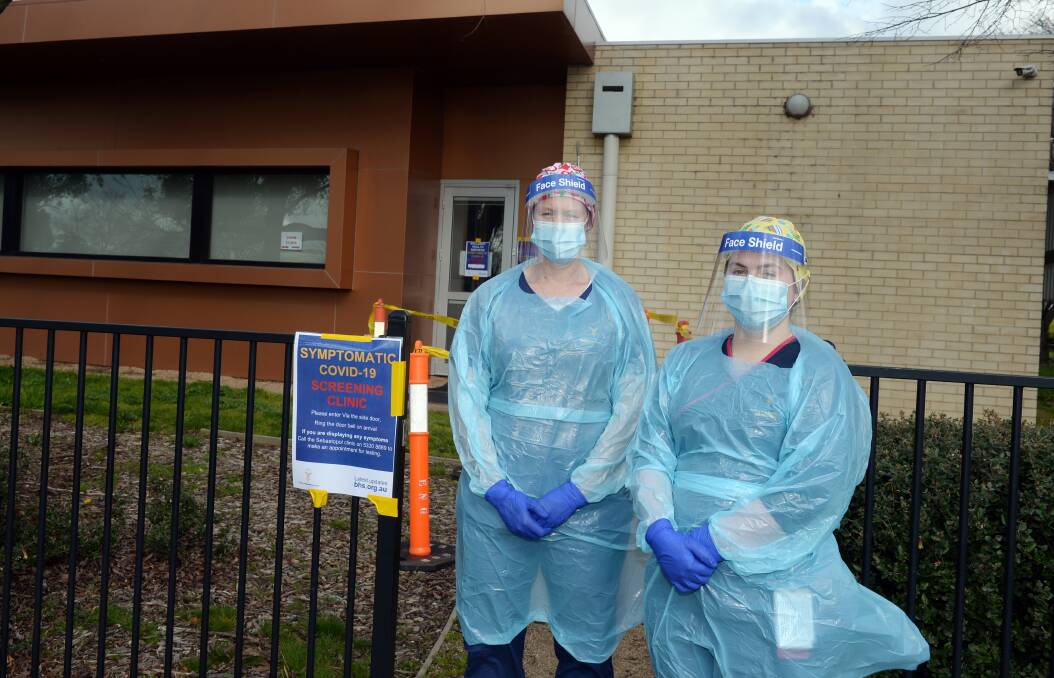DEFENCE: Nurses Carmen Kennett and Sarah Baker are ready to screen for coronavirus at the city's new testing site in Sebastopol. Picture: Kate Healy