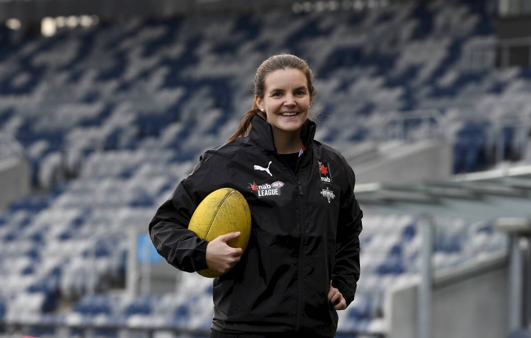 FOCUS: AFLW premiership player Sally Riley did not have a defined girls football talent program growing up. She will help guide girls and boys as a Rebels assistant coach.