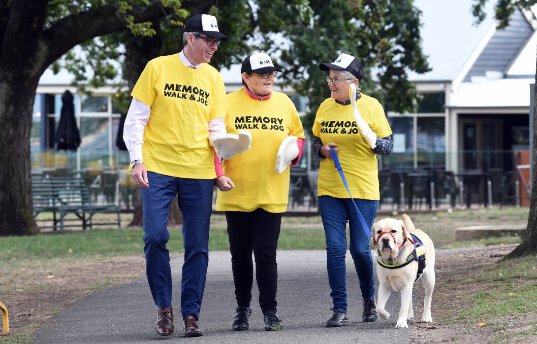 STEPPING UP: Dementia expert and geriatrician Mark Yates with dementia champions Edie Mayhew, who has younger onset dementia, Anne Tudor and dementia assistance dog Melvin. Picture: Kate Healy