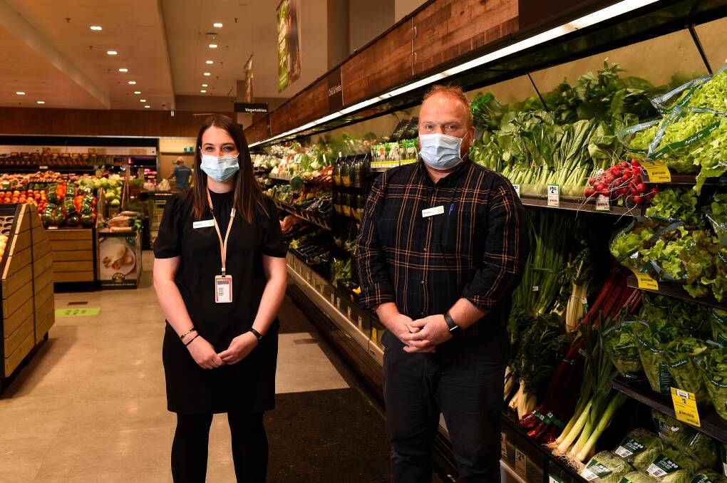 PRAISE: Woolworths Ballarat Central's Elysha Wilson and Shane Darroch say recognition is largely thanks to customer generosity in a tough year. Picture: Adam Trafford