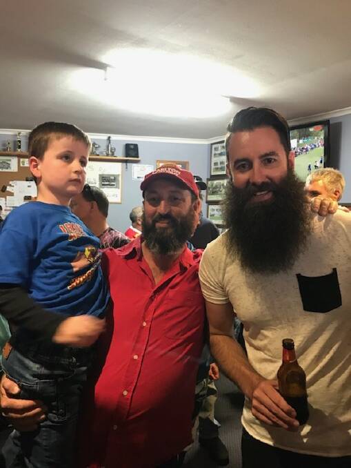 Bearded heroes Manny Mason, pictured with son Xavier, and Aaron Thompson before the big shave.