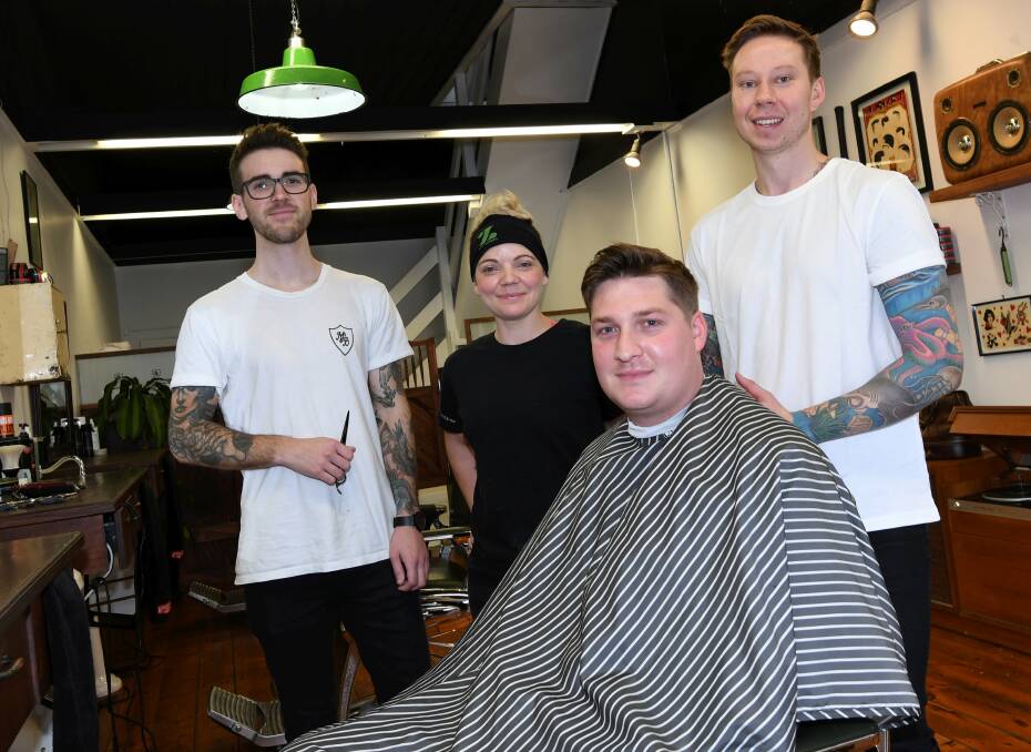 AT THE READY: Musket and Bayonet's Mark Debney, Zambrero's Melissa Coutts, headspace's Andy Penny, program graduate Jakson Smith are keen to get more men chatting over a shave and bite to eat. Picture: Lachlan Bence
