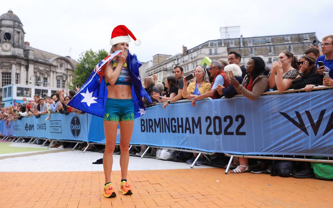 We can hardly wait for more inspirational moments like this (Christmas digitally altered) one of women's marathon winning mum Jess Stenson in our house. Picture: Getty Images