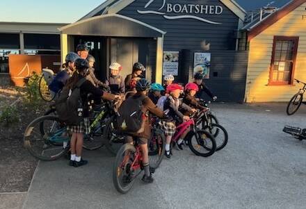 A peloton of junior cyclists gathered at Boatshed Restaurant to ride to Ballarat Grammar together for National Ride to School Day on Friday, March 22, 2024. 