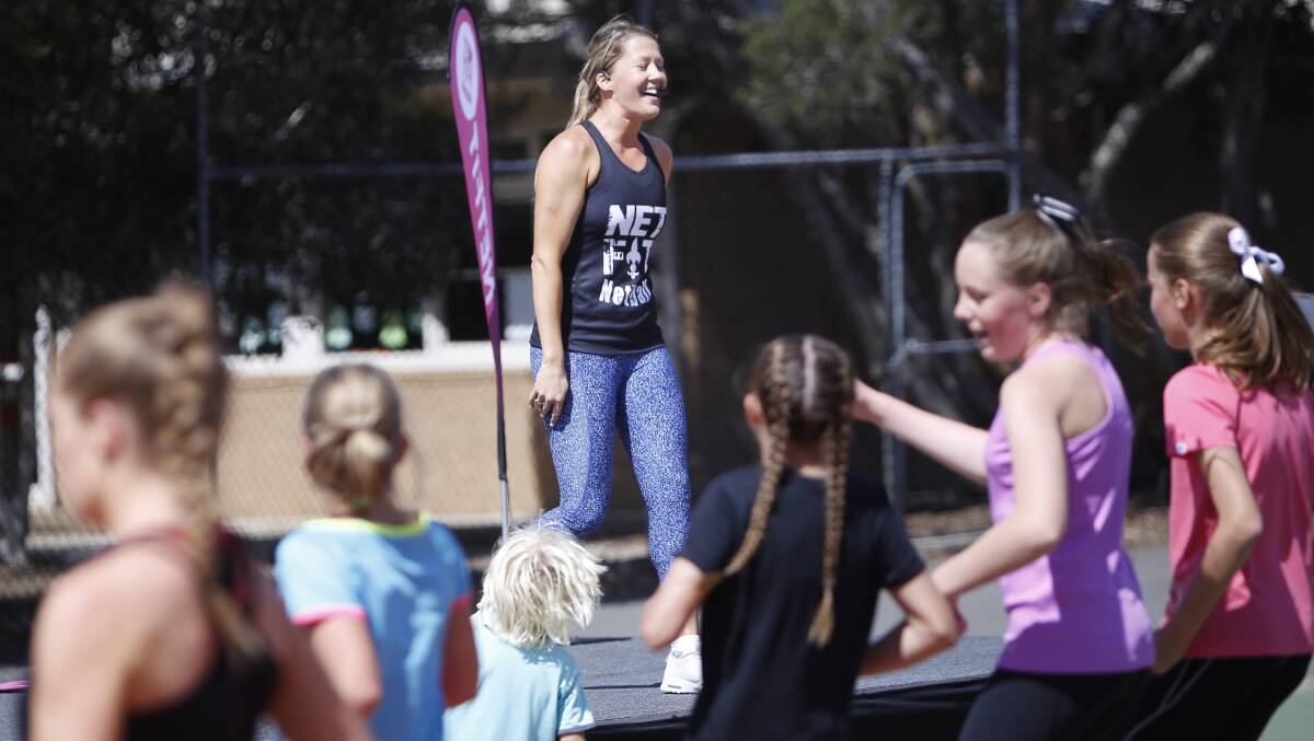 FUN: NETFIT creator Sarah Wall leads a junior fitness class in Ballarat, inspiring girls to sharpen their skills and feel empowered to never give upon their goals and dreams.
Picture: Luka Kauzlaric