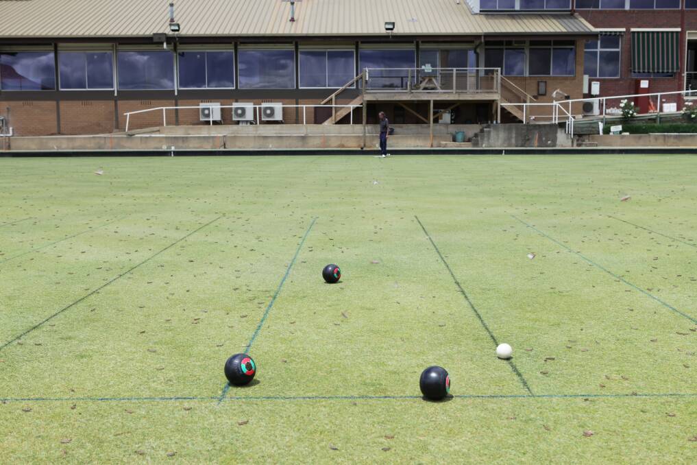 COMING TO THE HEAD: Daylesford Bowls Club greens were speckled with locusts. Picture: Adam Trafford