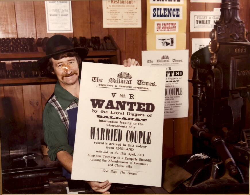 Sovereign Hill printer Peter Gilbert with his Wanted poster he presented to Prince Charles and Princess Diana in 1983, signed off with 'God save the Queen!'