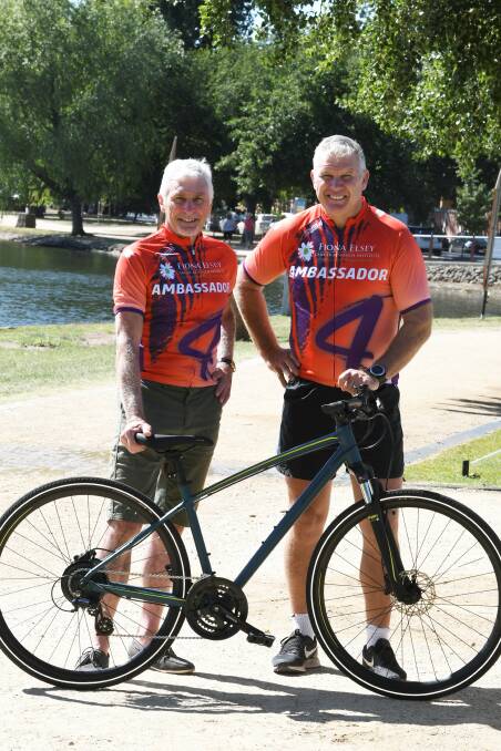 MISSION: Michael Malthouse and Danny Frawley visit Lake Wendouree this week calling on more people to join in the Reach4Research Cycle Classic. Picture: Lachlan Bence
