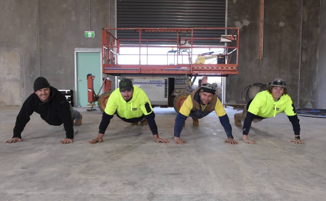 WORK IT OUT: Ballarat tradies Mathew Shanks, Julian Casey, Joel Wright and Liam Fisher want to raise awareness for mental health on and off-site. Picture: Lachlan Bence