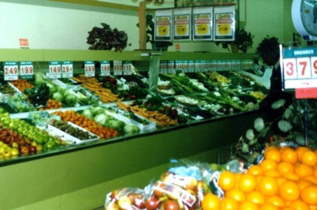 BEFORE: Prior to the supermarket's previous upgrades, the fresh produce displays  were single level and held less produce.

