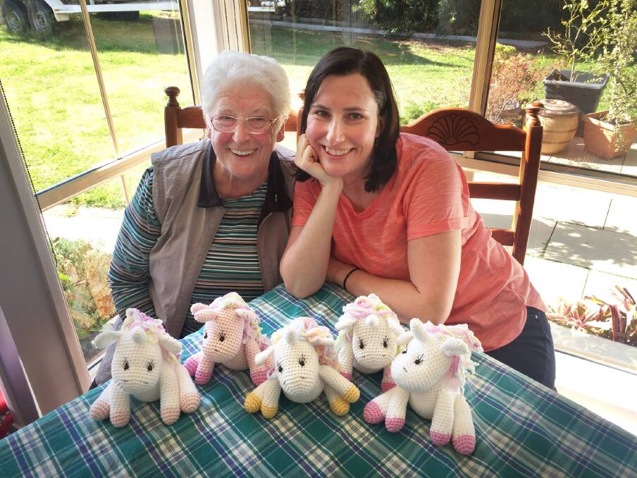 ANNIE BELLA'S GIFTS: Ellen Hutchison with her mum, Pat and some of their baby amigurumis. Photo: Supplied