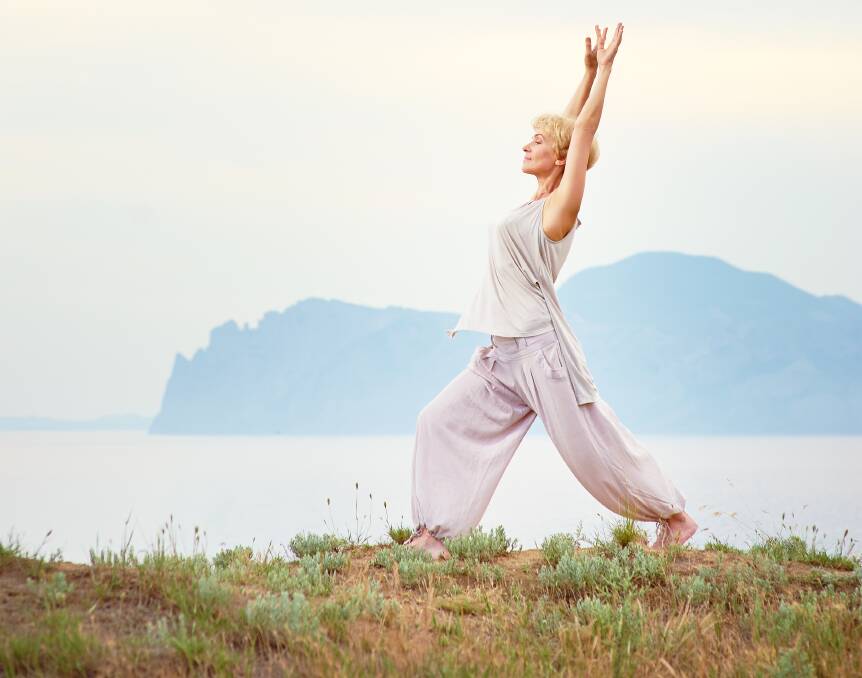 AT PEACE: Yoga is helpful for our mental wellbeing, as it works with breathing techniques and meditation to help direct our mind to dwelling in the present. Photo: Shutterstock.