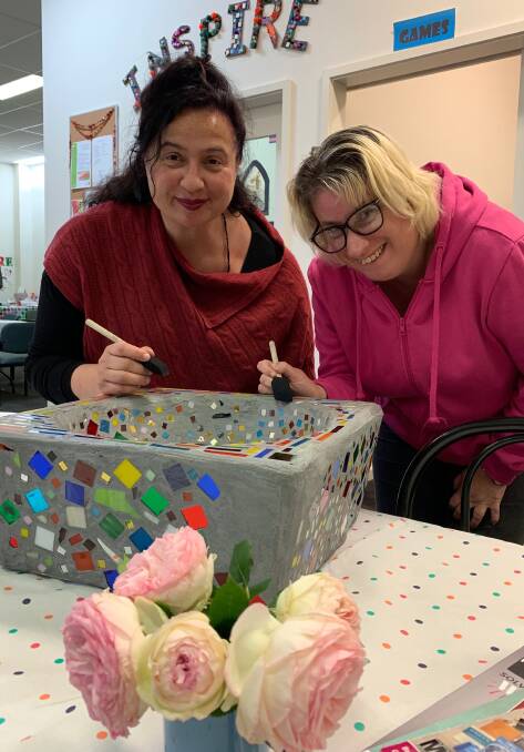 CARE: Katrina (pictured right) accesses Inspire Support centre-based activities to grow her social network and participate in activities, with support from Inspire worker, Sia.  
