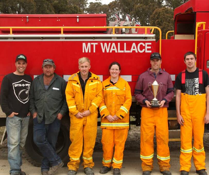 CHAMPIONS: The Mount Wallace fire brigade came through the multiple challenges to defeat the eight other crews and claim the Fiskville Cup. Picture: Chris Tom.