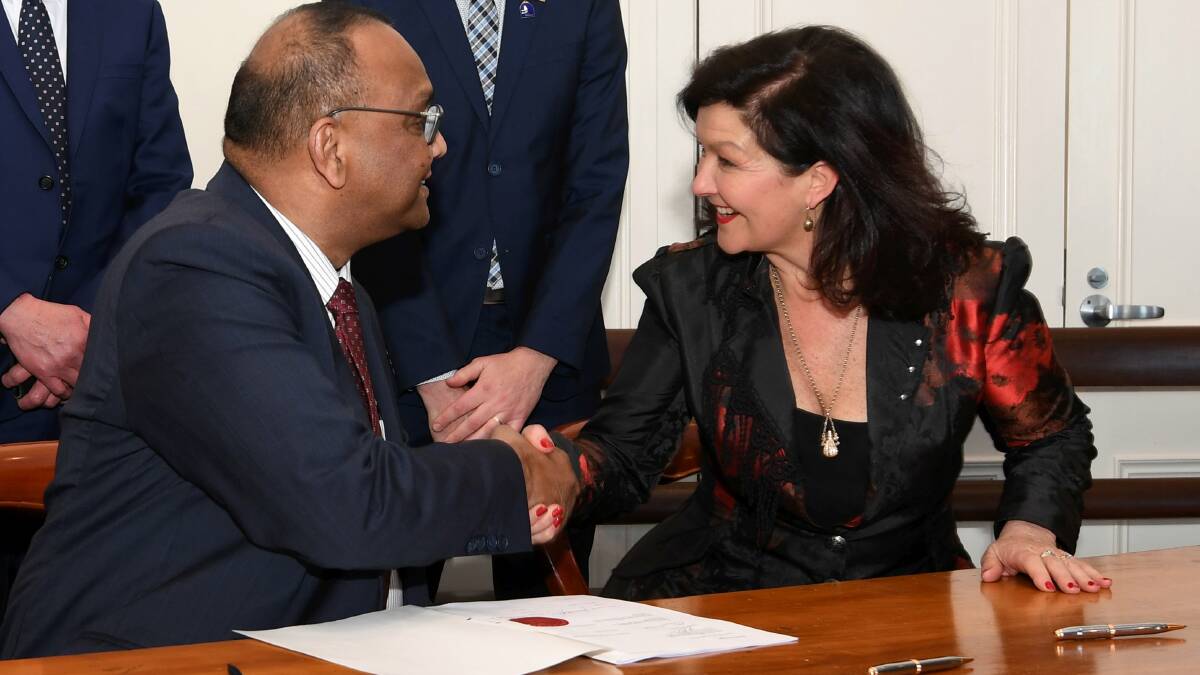 MRCB chief executive Raiv Kirshnan signs an agreement with City of Ballarat mayor Samantha McIntosh. File photo