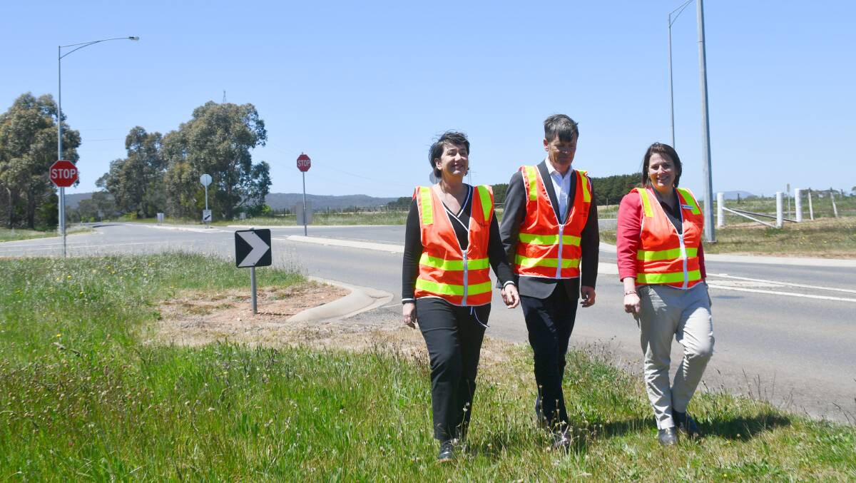 UPGRADE: State Roads Minister Luke Donnellan (centre) at the Gillies Road-Kennedys Road intersection, with local Labor candidates Michaela Settle and Juliana Addison. Picture: Alex Ford