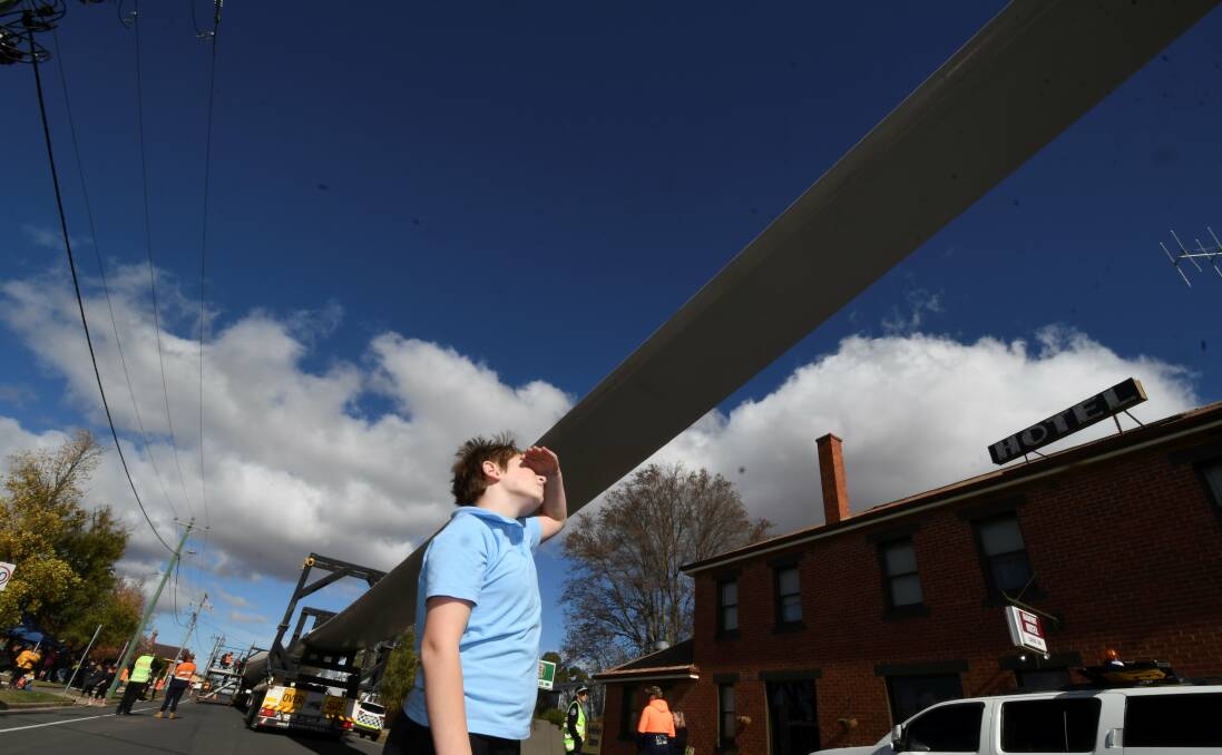Sweep: 10-year-old James, from Trawalla Primary School, gazes at the blade in Beaufort. Pictures: Lachlan Bence