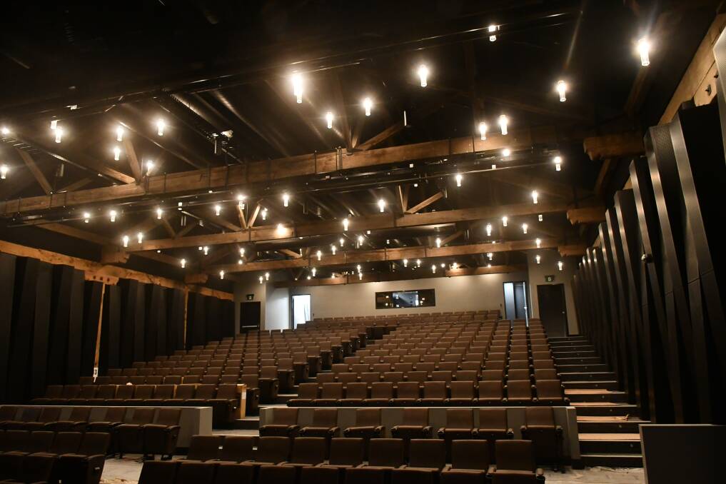 The theatrette has access to larger spaces on both sides.