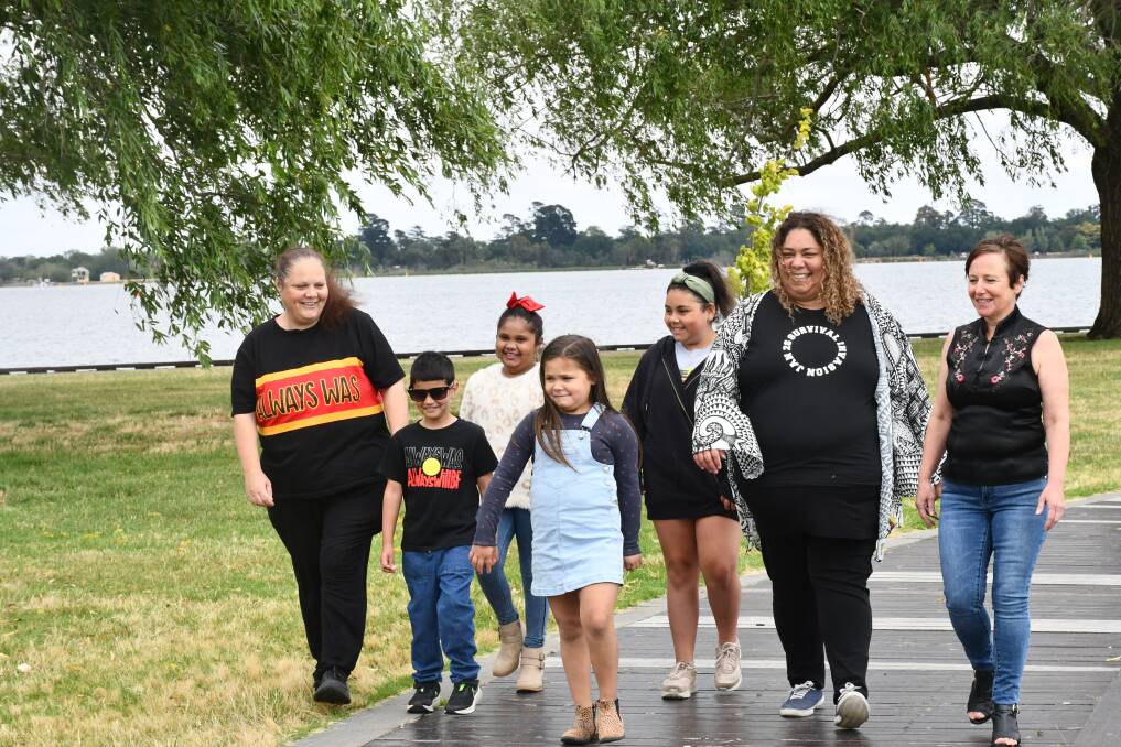 Together: Rachel Muir and Deb Lowah Clark, with Samuel and Samara Zakkam, Kaisha Nickels, Mercy Clark, and City of Ballarat councillor Belinda Coates. Picture: The Courier