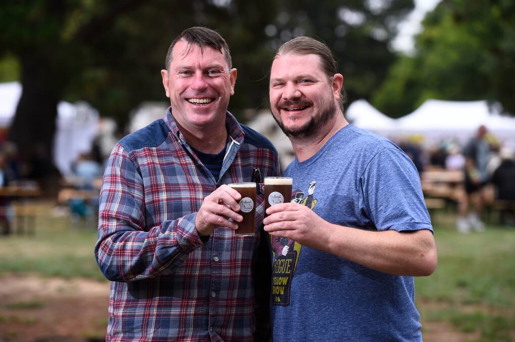 Dream fulfilled: Homebrewers Paul Richter and Daniel Court try some of their own beer at the Ballarat Beer Festival. Picture: Adam Trafford